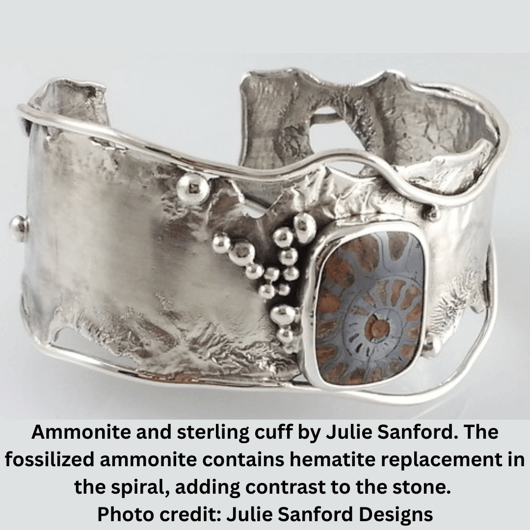 Ammonite and sterling cuff by Julie Sanford. The fossilized ammonite contains hematitie replacement in the spiral, adding contrast to the stone. Photo credit: Julie Sanford Designs