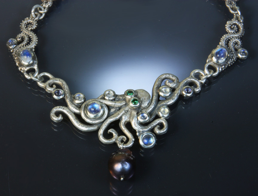 Sterling silver octopus necklace with green diamond eyes, rainbow moonstones, iolites and grey freshwater pearl drop