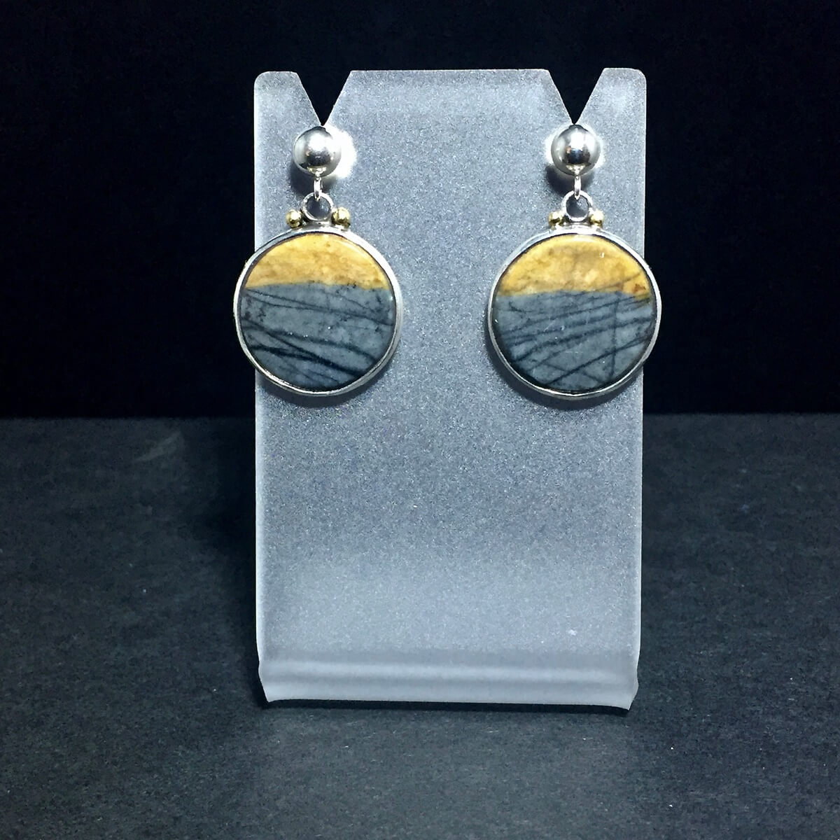 Utah Picasso Marble earrings, set in Sterling/Fine Silver/18K Gold.
Contact me to purchase.
https://dancing-raven-stoneworks-llc.square.site/contact-us
