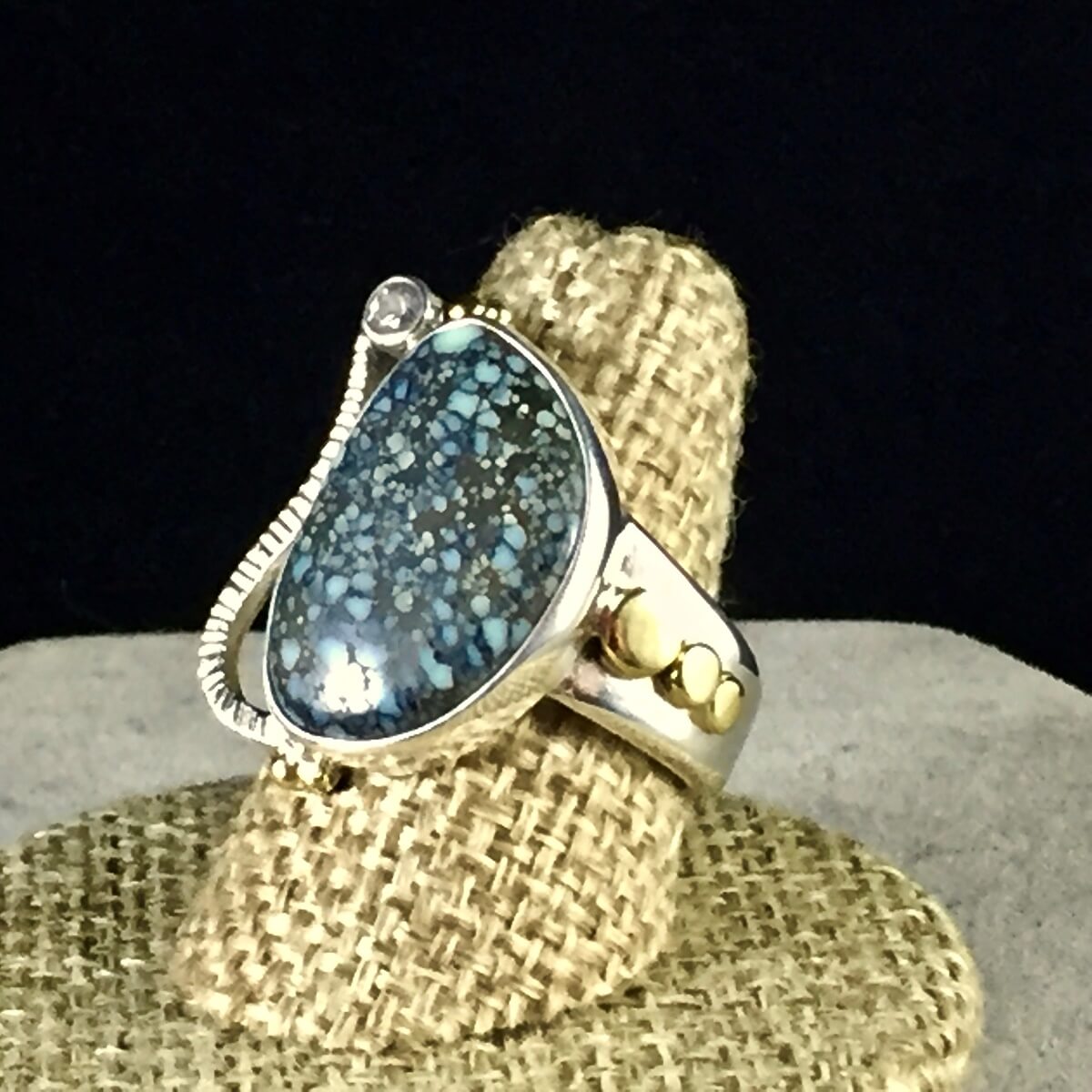 New Lander Chalcosiderite-Variscite and white sapphire contemporary ring,
set in sterling and fine silver, and 18K gold.
https://dancing-raven-stoneworks-llc.square.site/product/drs-19-104-new-lander-sapphire-ring/92?cs=true