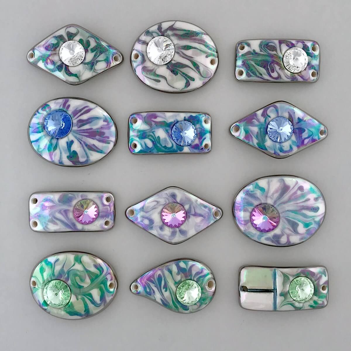 Marbled bracelet bars with attachment holes or styled to glue onto a cuff pad.
