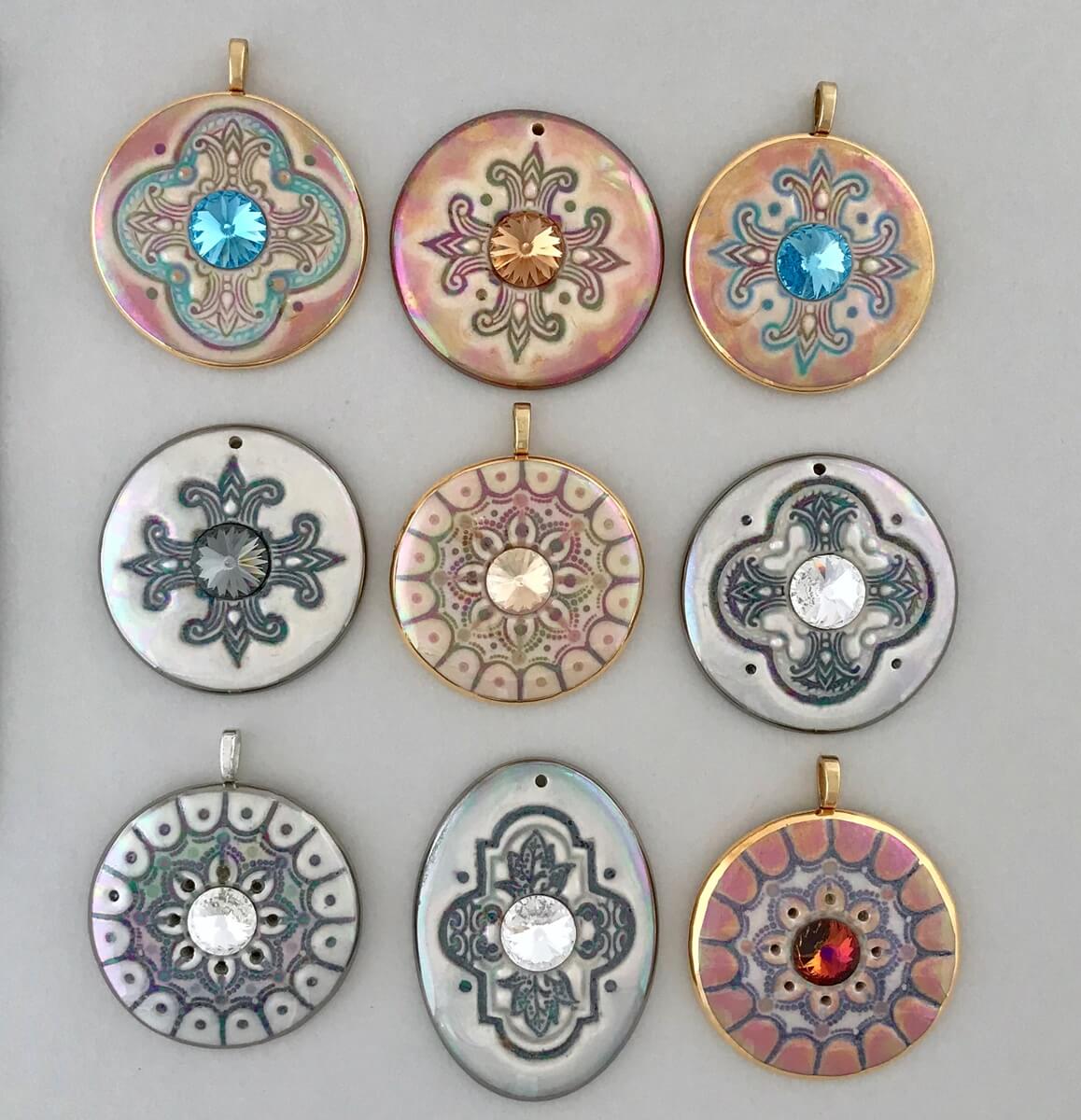 Mandala statement pendants accented with Swarovski Rivoli crystals.