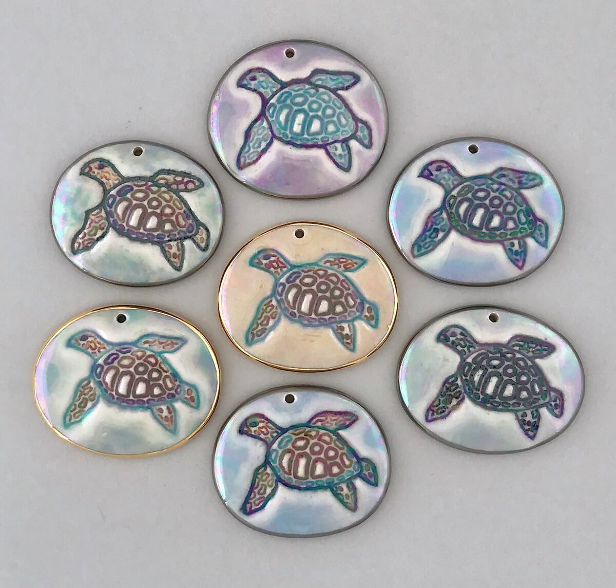 One of a kind sea turtle pendants, each one is individually handpainted.