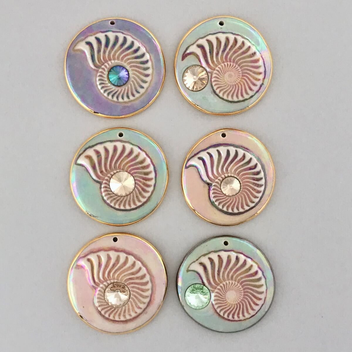 Nautilus shells accented with Swarovski crystal accents.