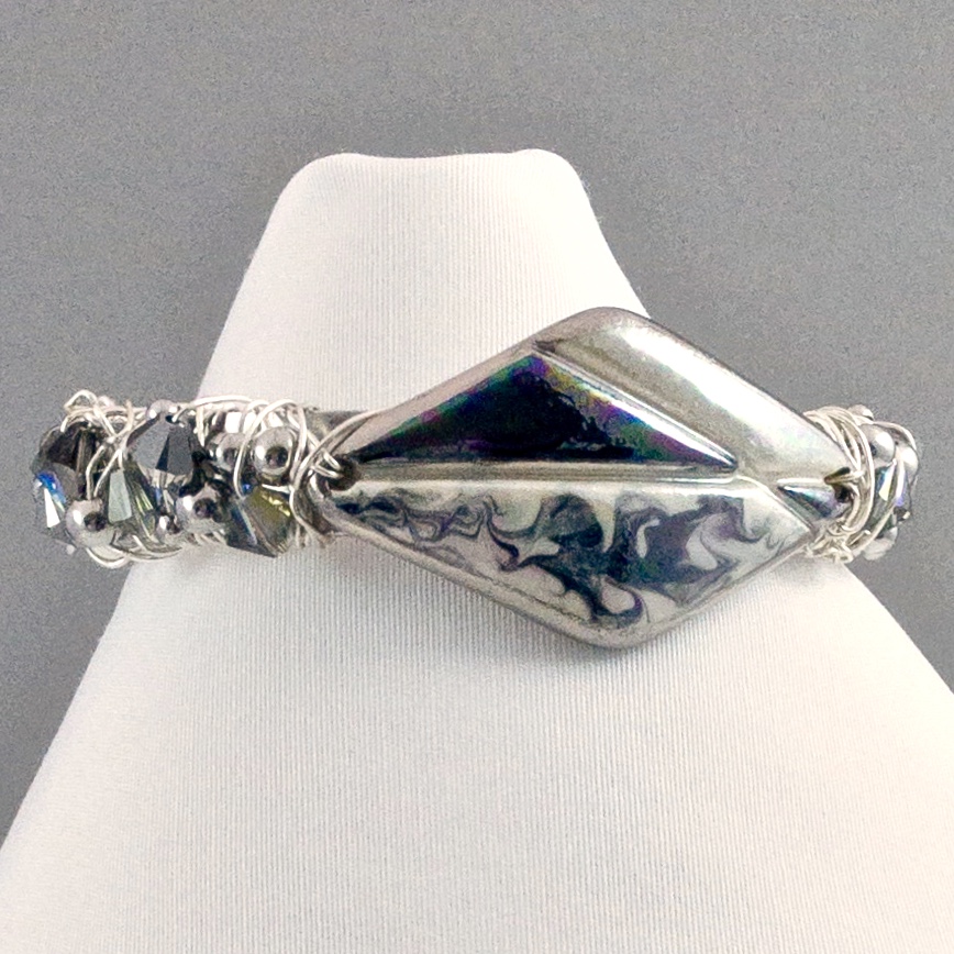 Finished bracelets featuring our porcelain bracelet bars & Swarovski crystals.