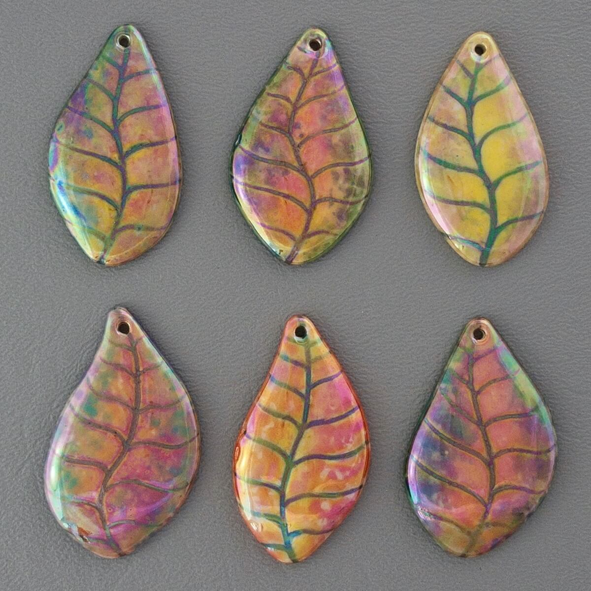 Fall leaf pendants, each handpainted with multiple colors.