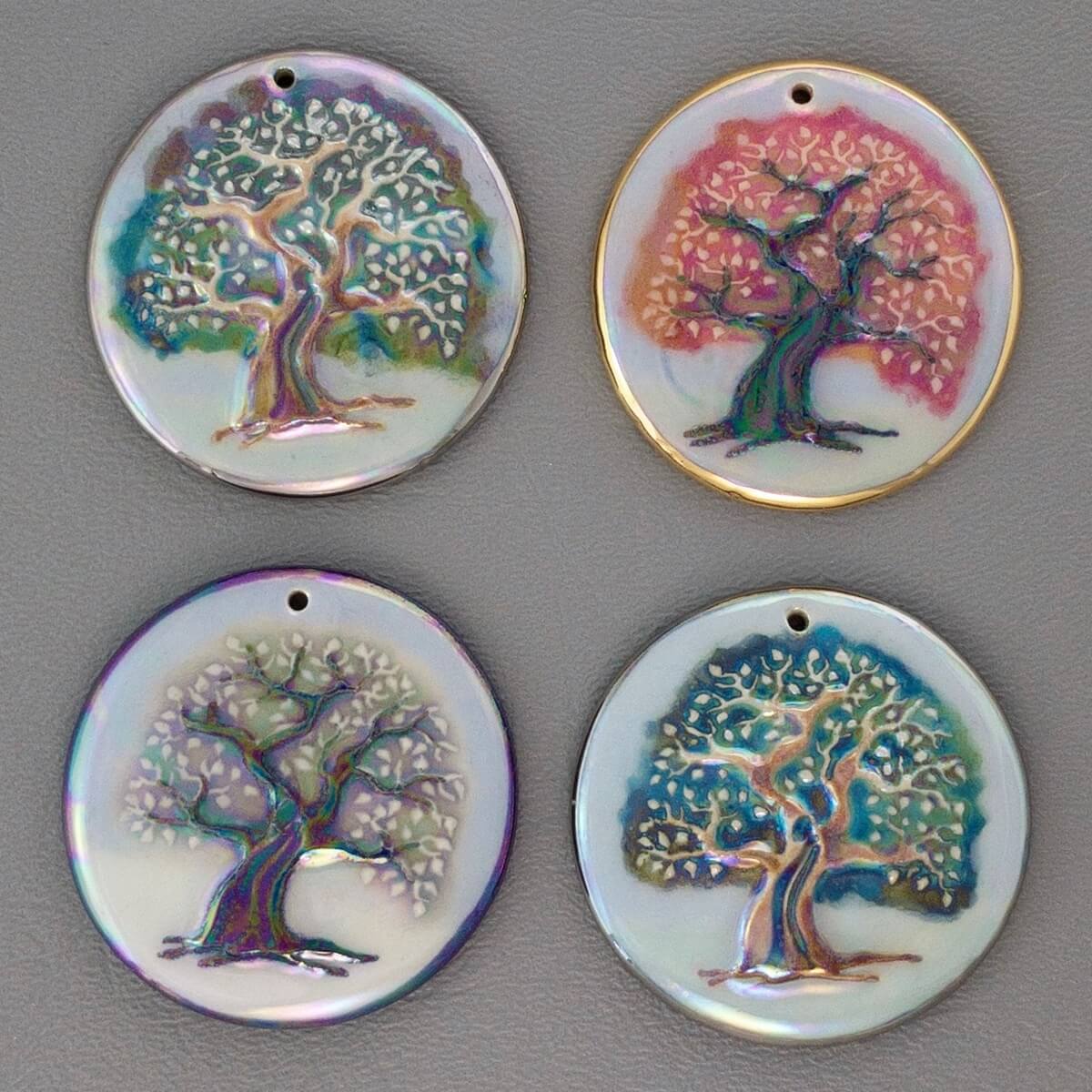 Statement tree pendants decorated in summer, fall & winter colors.