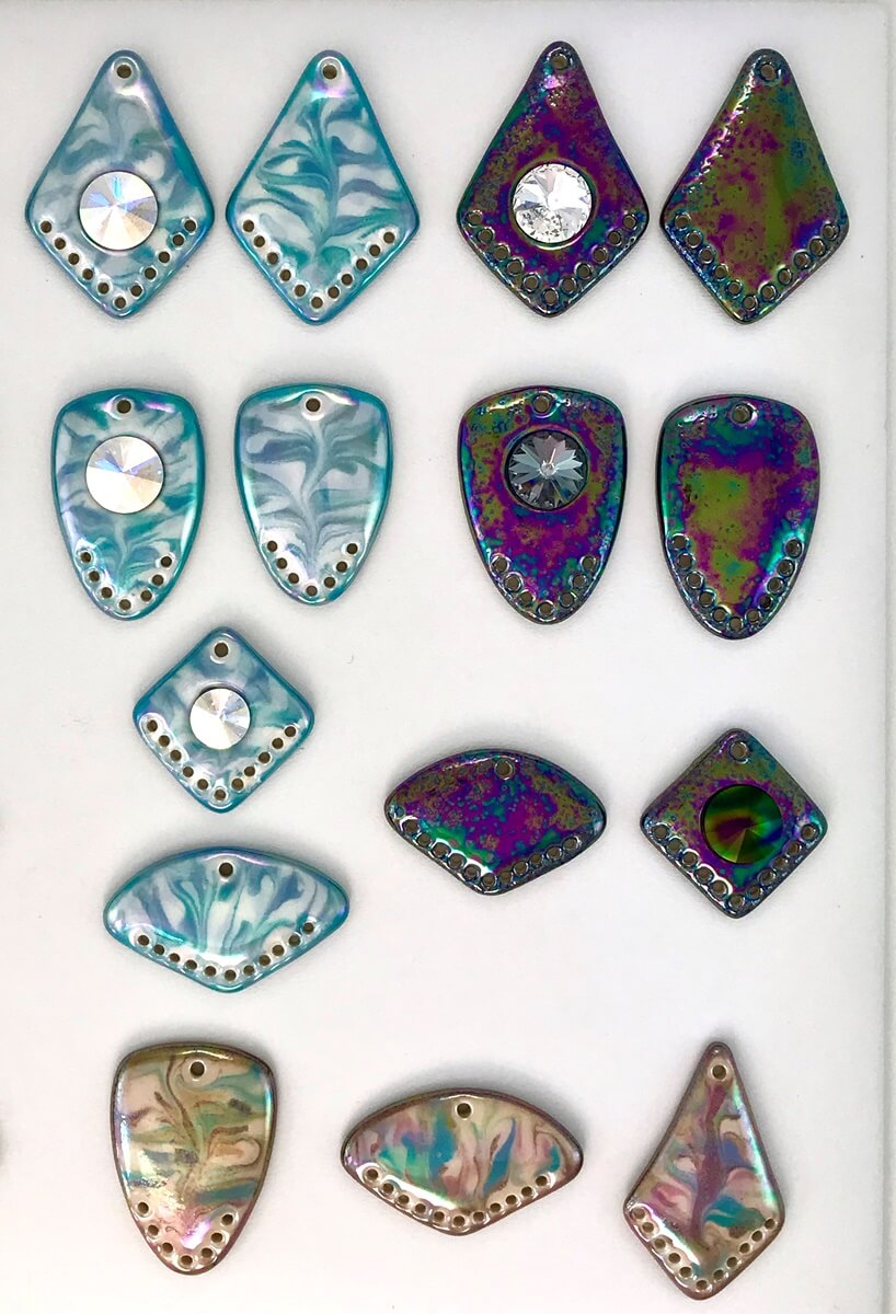 Marbled porcelain pendant components with additional holes for adding beadwork, etc.