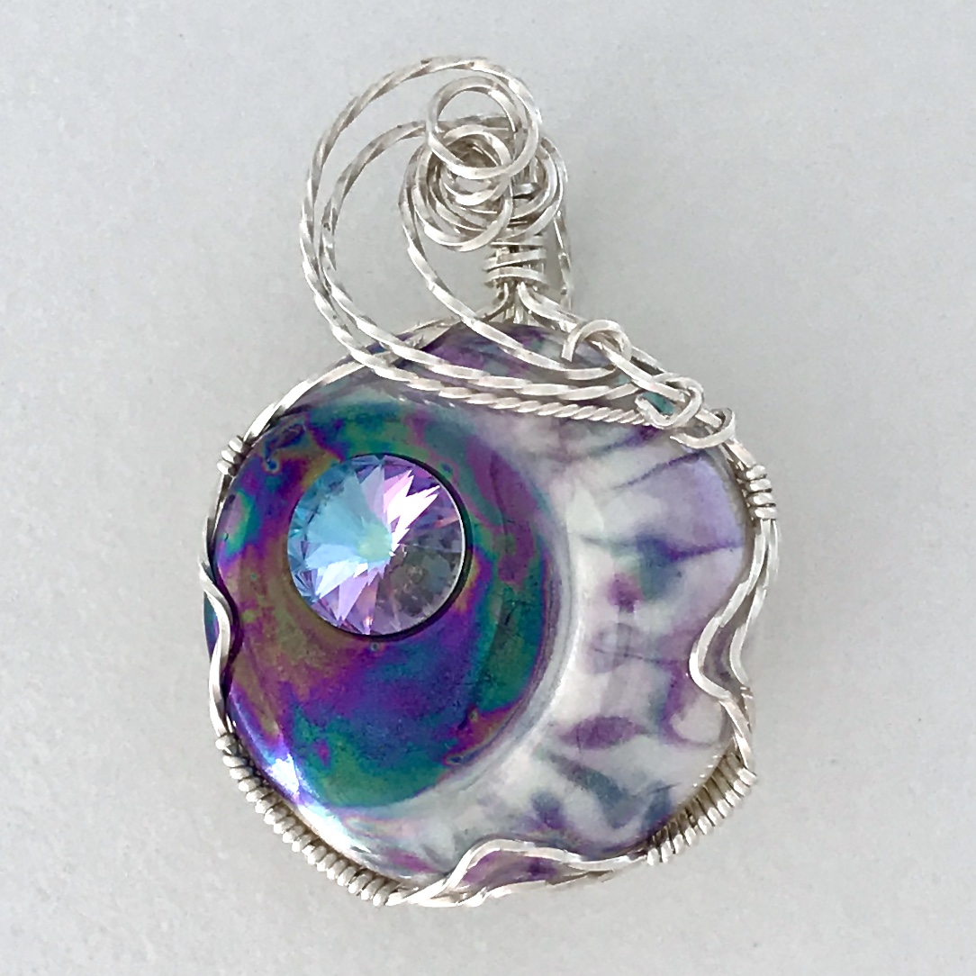 Porcelain moon cabochon wrapped in Argentium sterling silver wire.