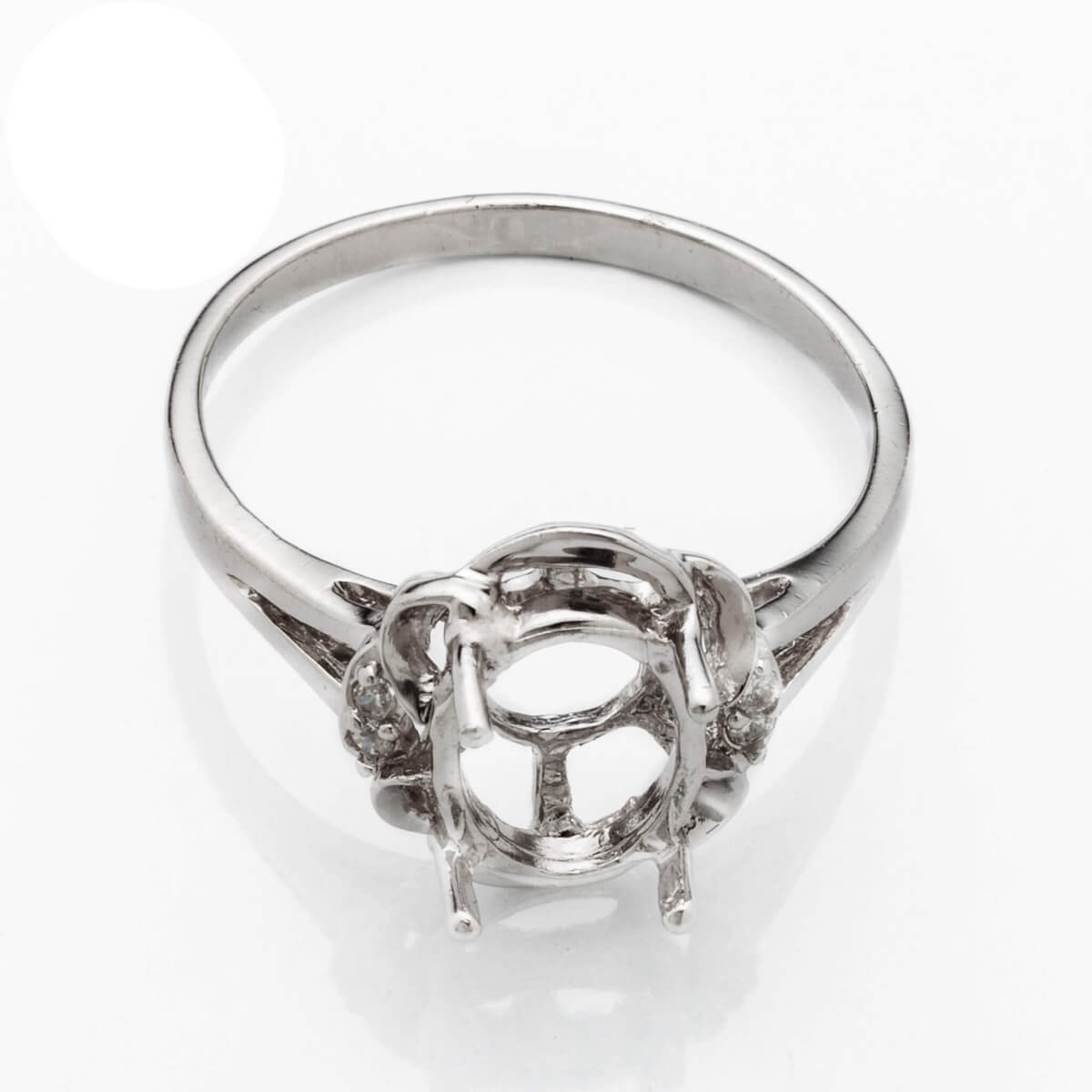 Ring with Side Cubic Zirconia Inlays and Oval Prongs Mounting in Sterling Silver 7x9mm 