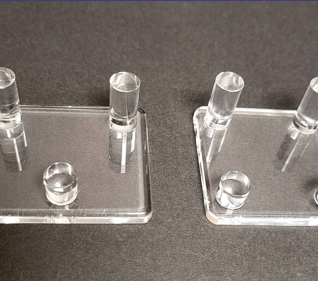 Acrylic bases with prongs. Clear-curved with 3-4 prongs to elevate your minerals