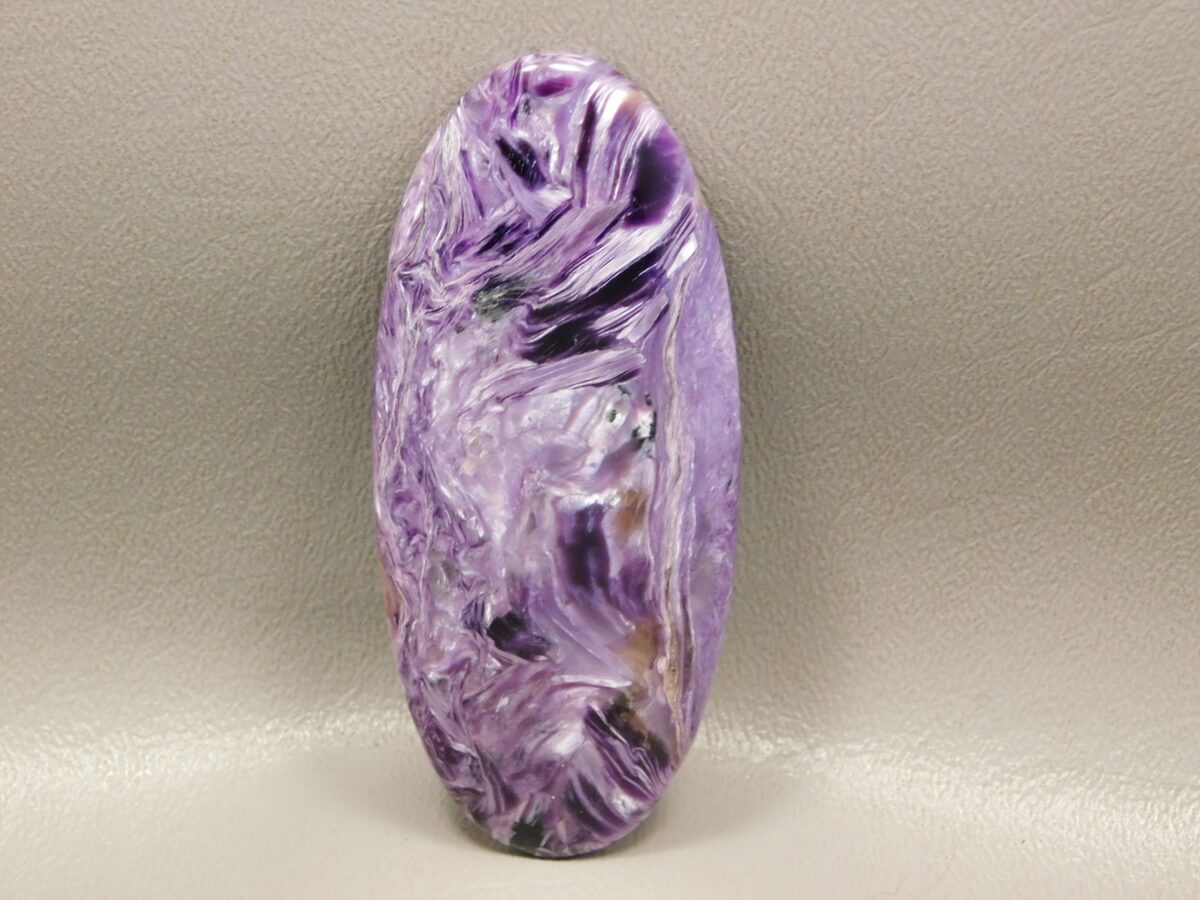 A charoite cabochon