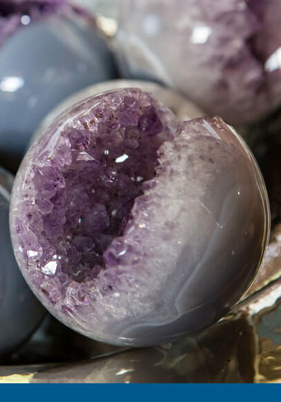 An Amethyst and Agate sphere.