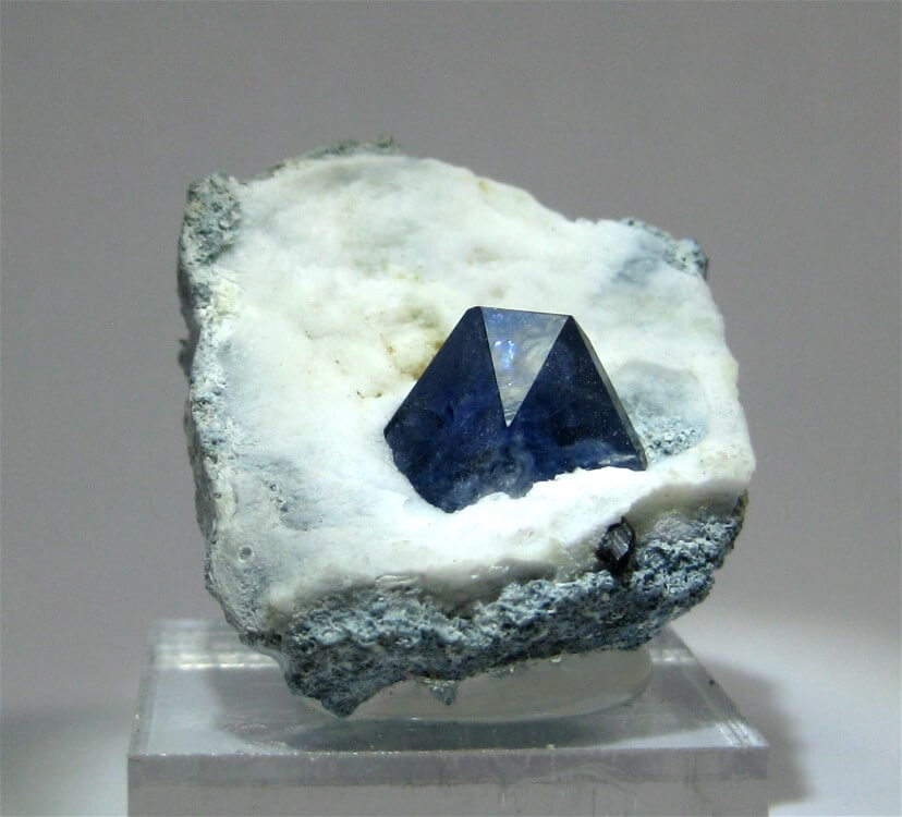 A beautiful crystal of Benitoite on a bed of Natrolite.