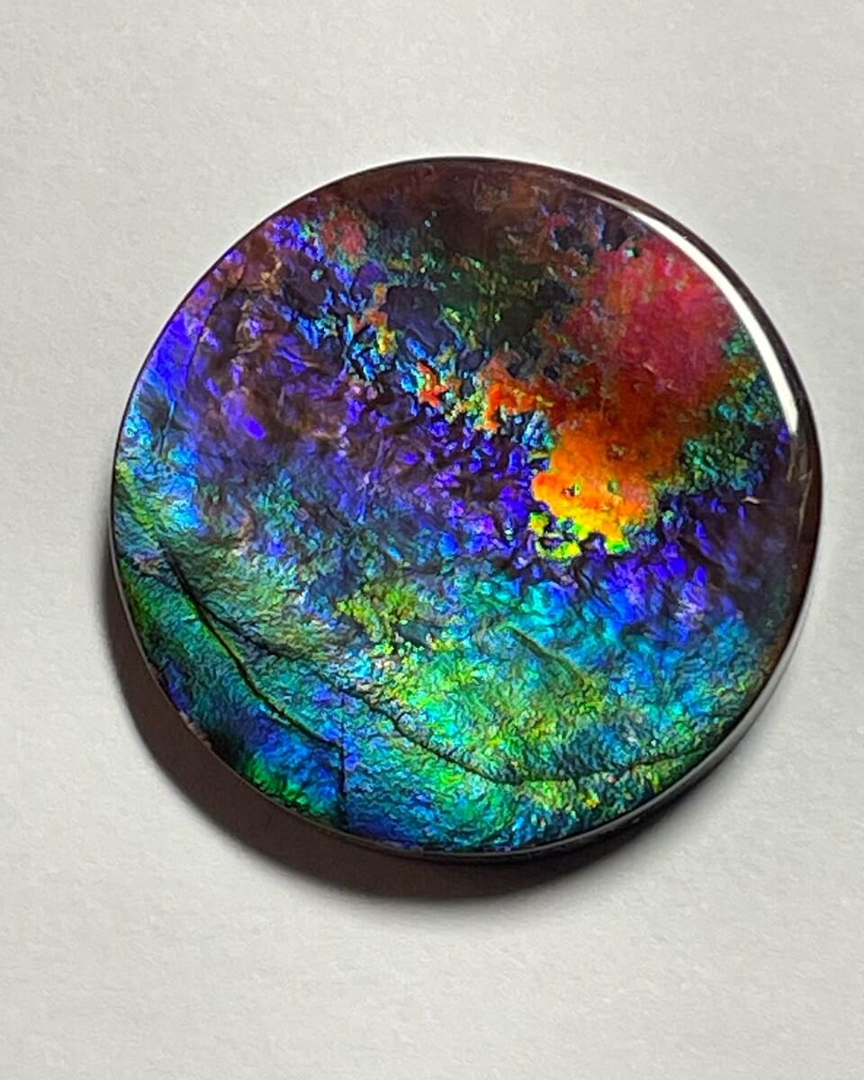 An Ammolite cabochon