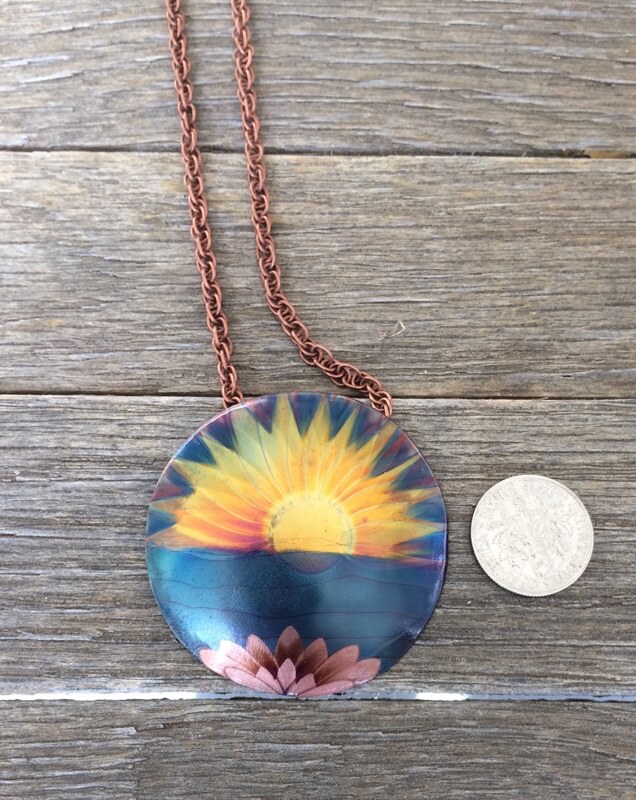 1 1/2” flame painted copper sunset pendant on 18” metal chain: $25