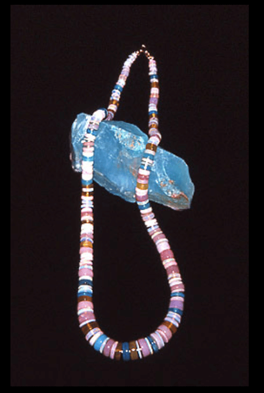 Peruvian blue and pink, American golden, and Australian precious opals; 14K clasp